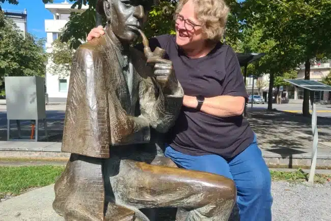 Cheryl chatting with Sherlock Holmes in Meiringen, Switzerland, 2024